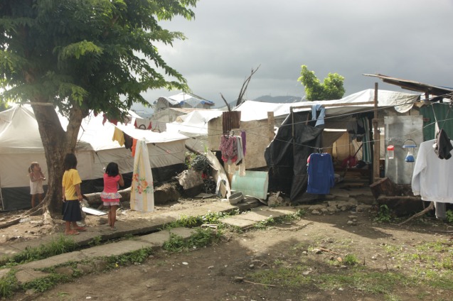 Nearly a year later, people still live in tents in Tacloban a similar situation in Zamboanga. Photo by Jude Bautista