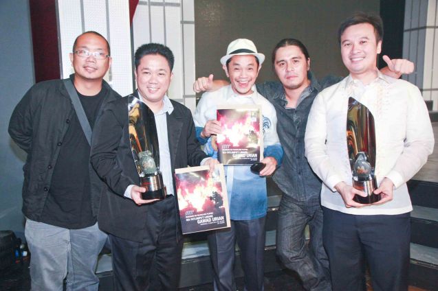 from left AMOK team: Writer Paul Sta. Ana, John Bedia, Best Supporting actor nominee Garry Lim and director / Best Editing awardee Lawrence Fajardo, with Best Picture awardee Producer Alemberg ANG ANG SAYAW NG DALAWANG KALIWANG PAA. Photo was taken during the 35th Gawad Urian awards night last June 13, 2012 at the AFP Theater. Photo by Jude Bautista